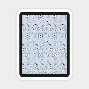 Whimsical flower pattern with a light blue background Magnet