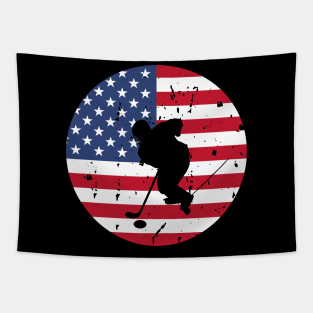 American Flag and Ice Hockey Player Silhouette, A silhouette of an ice hockey player overlaid on a distressed American flag, encapsulating patriotism and sportsmanship. Tapestry