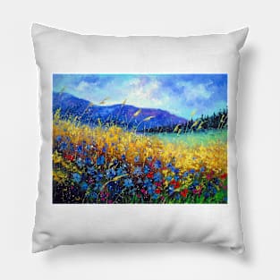 Blooming field near the mountains Pillow