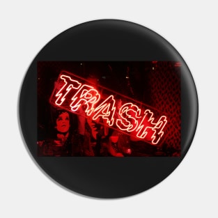 Red neon light sign of a store called "Trash" in the Lower East Side Pin