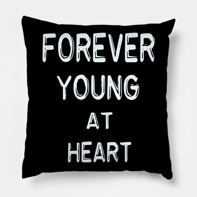 forever young at heart Pillow by hamadani