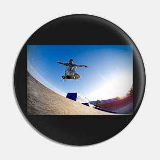 Skateboarder flying Pin