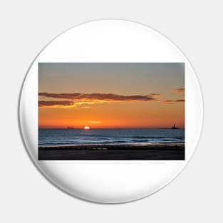 Sunrise over a tranquil North Sea Pin