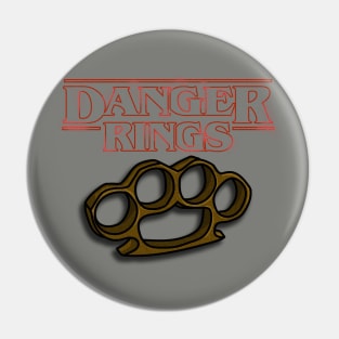 Danger Rings Parody Brass Knuckles Pin