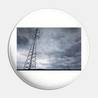 High-voltage power line against dark stormy clouds Pin