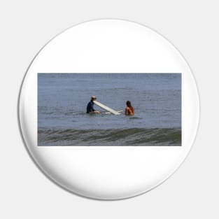 Two surfing friends sitting on their boards Pin
