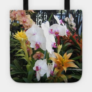 Colorful Orchids in Front of Wrought Iron Gate Tote