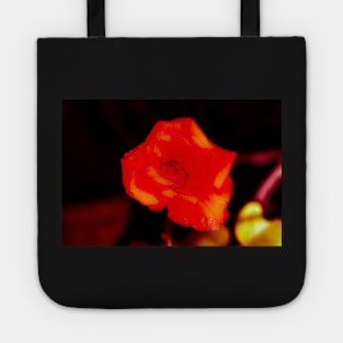 Orange rose blossom with yellow parts Tote