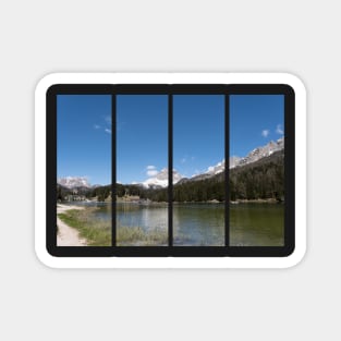 The fabulous alpine lake of Misurina in the Dolomites. Boat on the water. Lovely and relaxing place in the Italian Alps. Reflections in the rippled water. Sunny spring day. Magnet