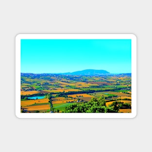 Scene in Montelupone with Marche landscape, various fields, a body of water, human settlement and Monte Conero Magnet