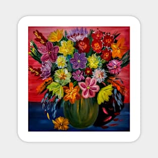 A beautiful bouquet of mixed flowers in a silver vase Magnet