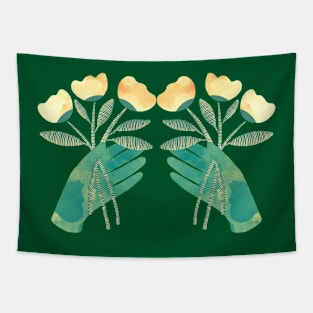 Green hands with yellow flowers on green background Tapestry