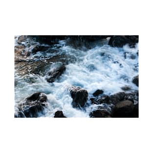 A breaking surge of sea water over rocks, Isle of Skye, Scotland T-Shirt