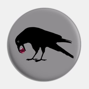 Black Crow with a Shiny Red Marble Pin