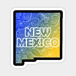 Colorful mandala art map of New Mexico with text in blue and yellow Magnet