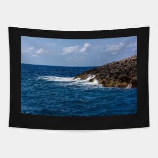 Waves beating against the rocks Tapestry