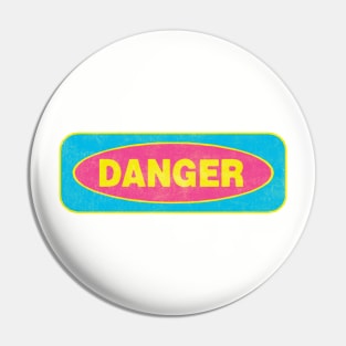Danger - blue & yellow on pink Pin