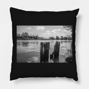 Wooden mooring posts on the River Bure in Horning, Norfolk Pillow