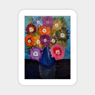 A lovely boutique of abstract vibrant bright colorful  flowers in a tall glass vase Magnet