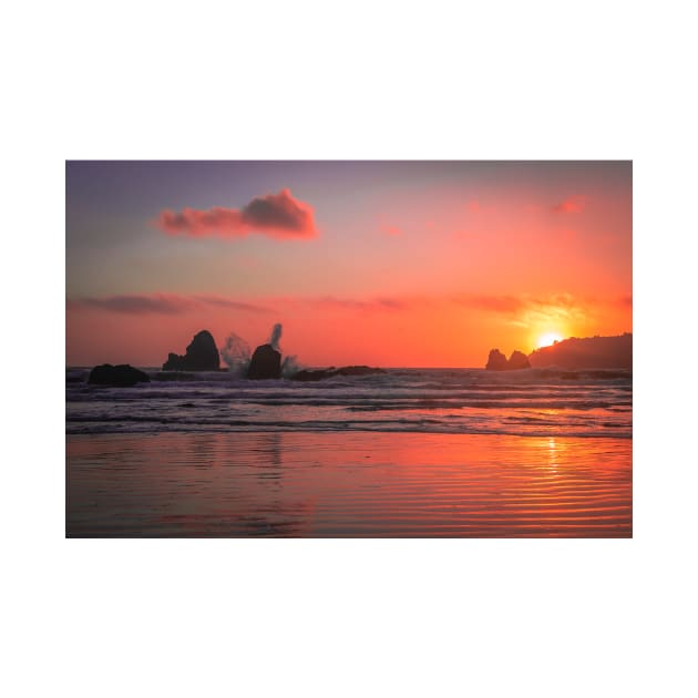 Waves crashing into rock at sunset by blossomcophoto