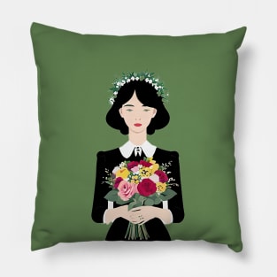 Young woman holding a bouquet of flowers Pillow