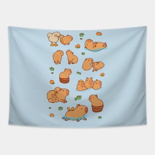 Many capybaras swimming with oranges, chilling and relaxing Tapestry