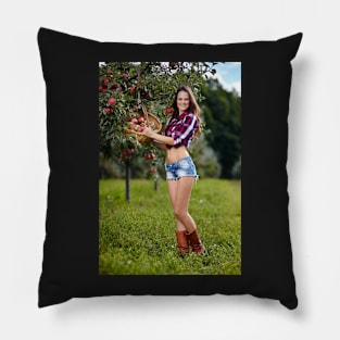 Beautiful woman picking apples Pillow