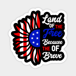 Patriotic Slogan with American Flag Motif, Bold graphic featuring the phrase "Land of the Free Because of the Brave" with an American flag-inspired design. Magnet