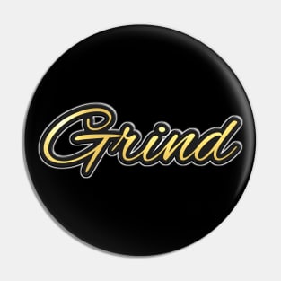 Shiny black and gold GRIND word design Pin