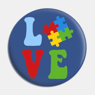 Love written with puzzle piece for autism awareness Pin