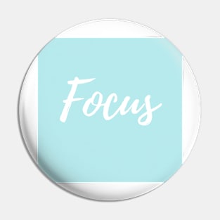 Focus - Turquoise Background Pin