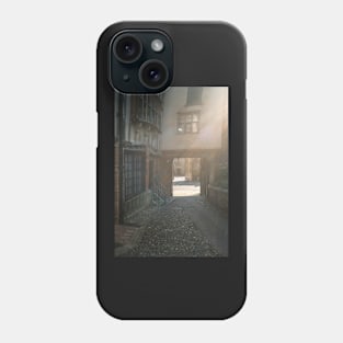 Medieval courtyard in Norwich bathed in sunlight Phone Case