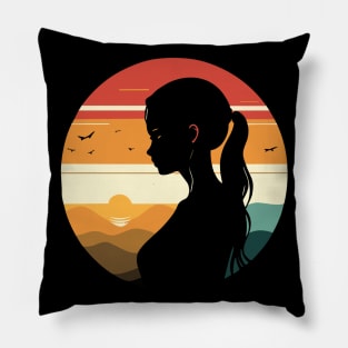 A T-shirt featuring a silhouette of a girl and stunning colors inspired by the sunset. Pillow