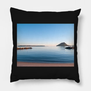 Landmark Mount Maunganui on horizon across Tauranga harbour at sunrise Pillow