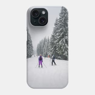 People skiing on the snowy slope Phone Case