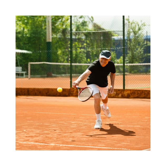 Active senior man playing tennis (F024/8848) by SciencePhoto