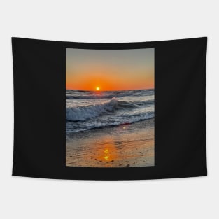 Photo of a sunset on the beach waves in the Mediterranean ocean of Tuscany Tapestry