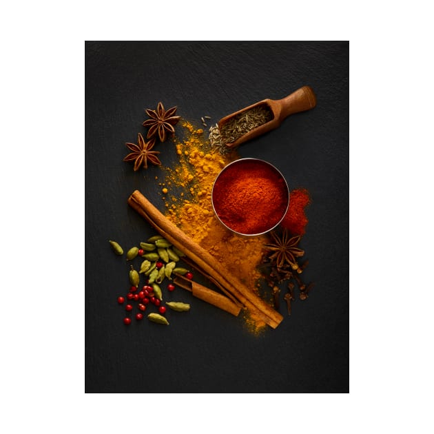 Dried spices on black slate (F020/5548) by SciencePhoto