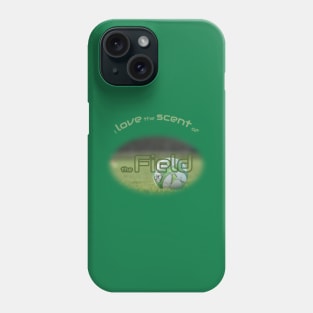 Green soccer ball in the field Phone Case