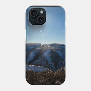 Sun on the mountainside in winter Phone Case