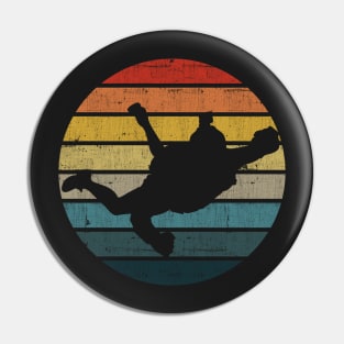 BASE jumping Silhouette On A Distressed Retro Sunset graphic Pin