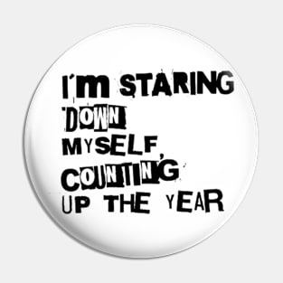 I´m staring down myself counting up the year Pin