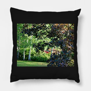 Red car hiding in the trees Pillow