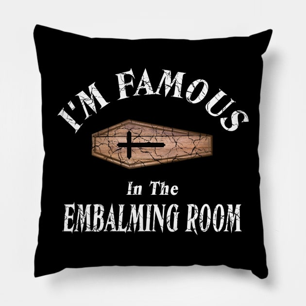 I'm Famous in The Embalming Room Mortician Saying Pillow by Graveyard Gossip