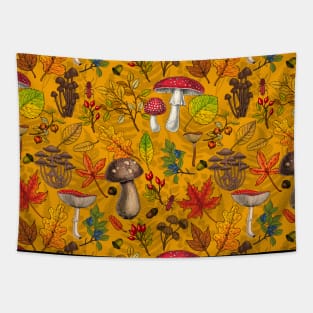 Autumn mushrooms, leaves, nuts and berries on orange Tapestry