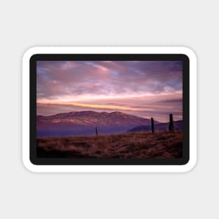 Hilly countryside at sunset Magnet