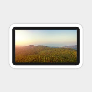 Aerial view of sunset over mountain jungle Magnet