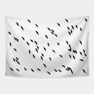 A Flock of Flying Birds in Black and White Tapestry