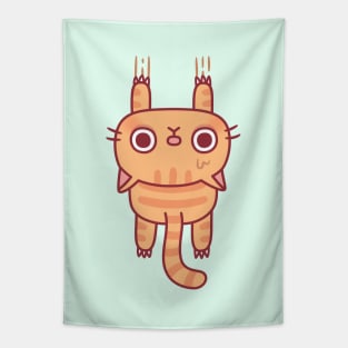 Funny Tabby Cat Using Claws To Hang On Tapestry