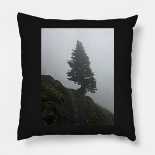 Solitary tree on a misty mountain top Pillow